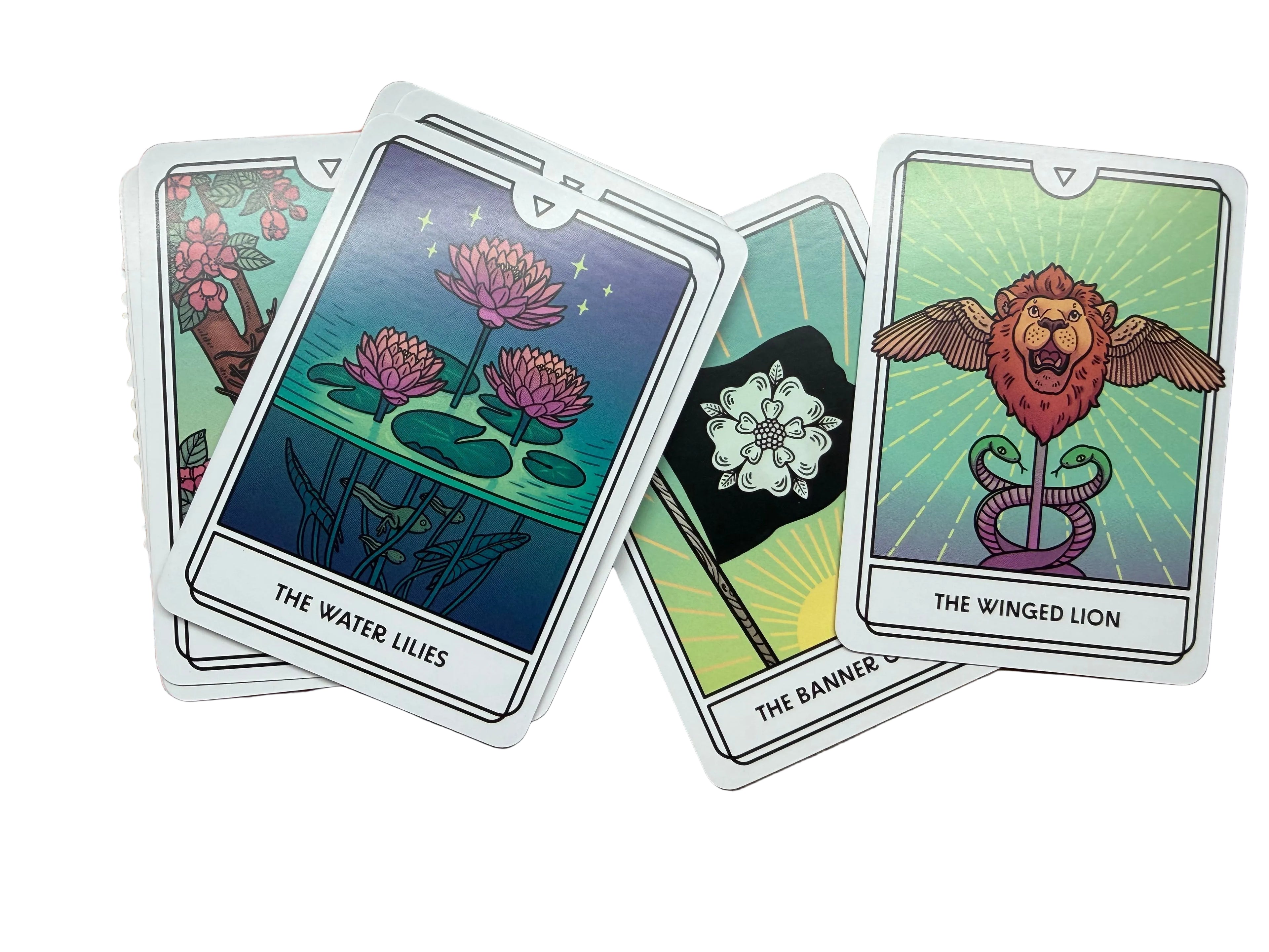 Tarot cards with illustrations on a wooden surface