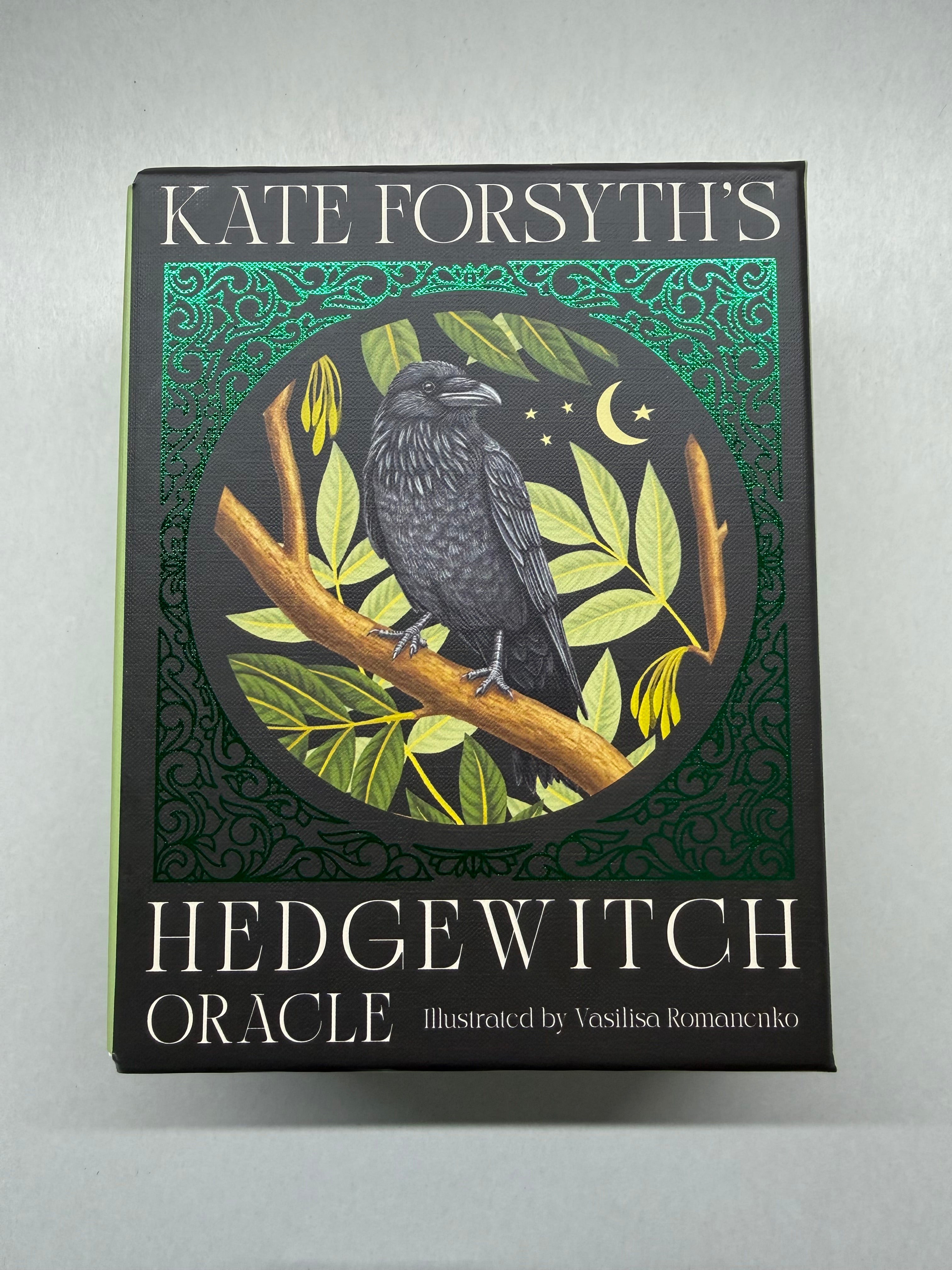 Hedgewitch Oracle book cover with a blackbird on a branch illustration.