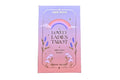 Card deck packaging with a rainbow and floral design on a wooden surface