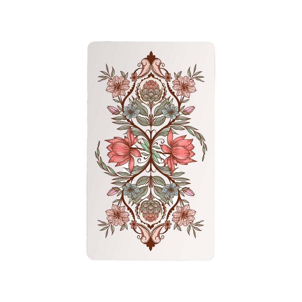 Decorative card with floral design on a marble surface