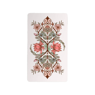 Decorative card with floral design on a marble surface